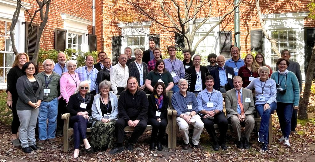 Photo of all attendees of the 2021 ANA Symposium.  There are 32 people outside on a fall day.  Some are sitting and some are standing.  Most are wearing lanyards for the conference. 